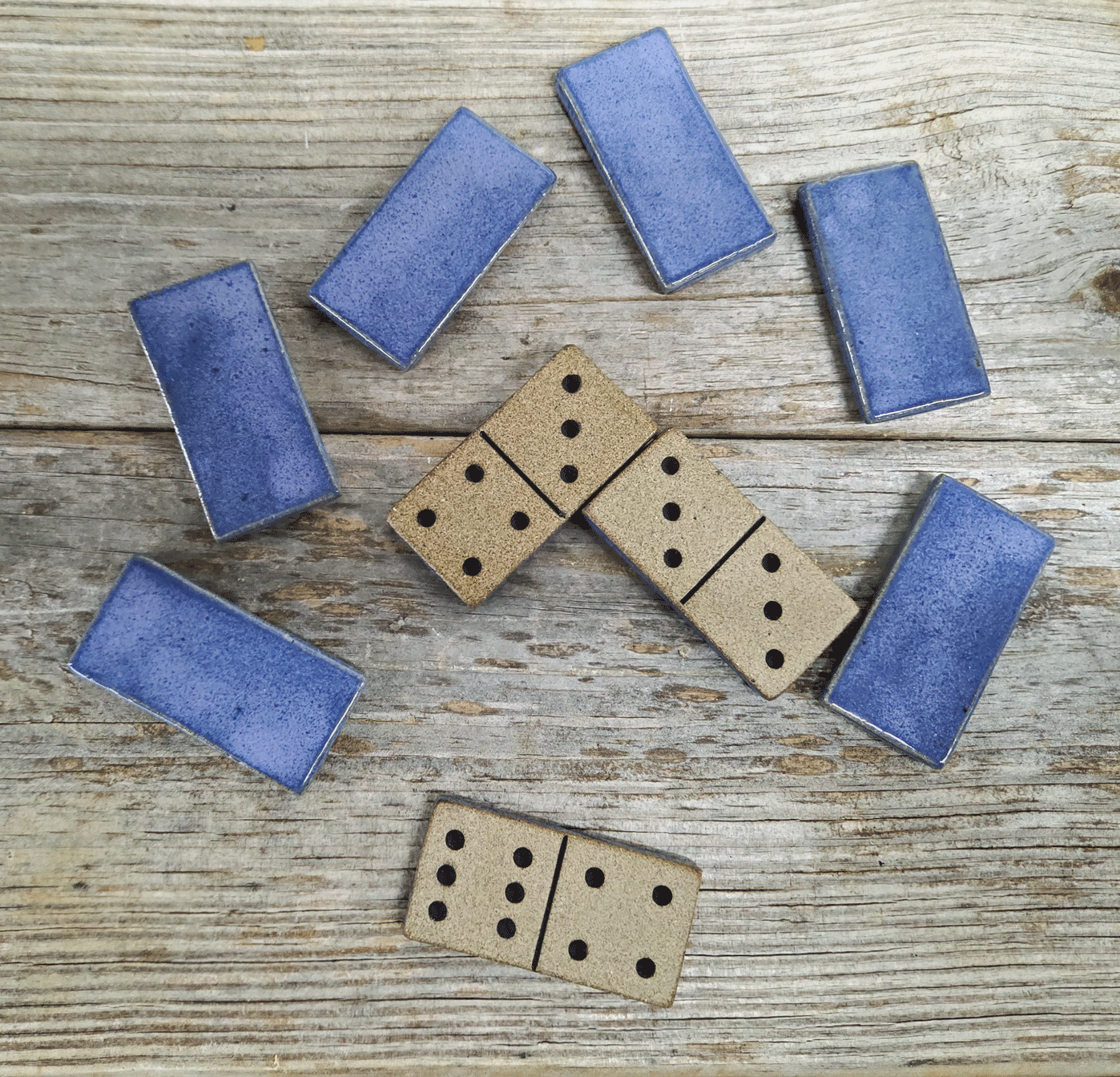 Purple domino set on a wooden background