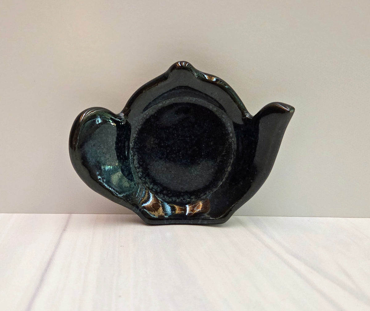 Stoneware tea bag caddy in black cosmos glaze.