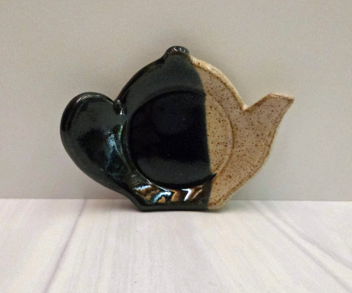 Stoneware tea bag caddy in black and eggshell glaze.