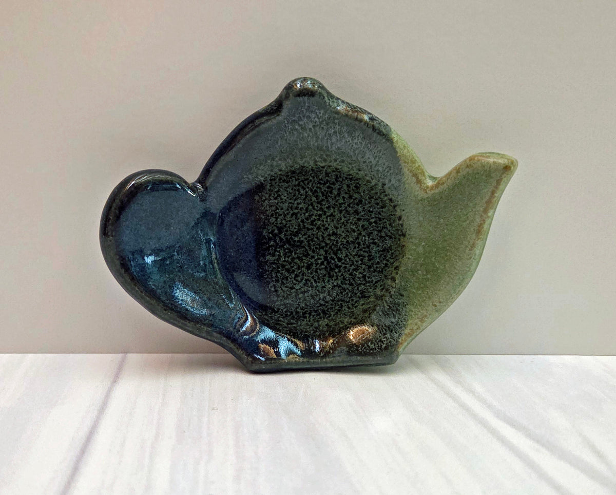 Stoneware tea bag caddy in dark blue and moss glaze.