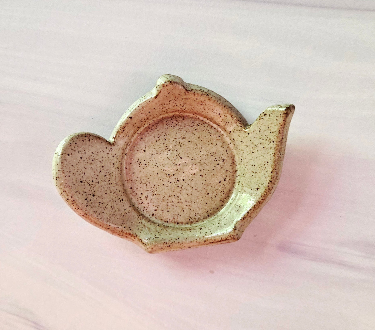 Stoneware tea bag caddy in eggshell glaze.